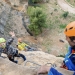 Una quincena de personas se inician en el rápel en la vía ferrata de la cantera de Serra Gelada
